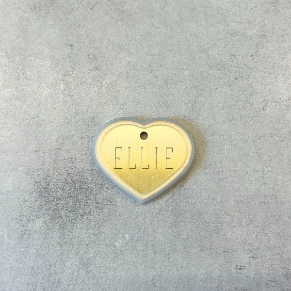 Rubber frame for dog tags so it doesn't make noise (large heart)