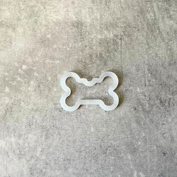 Gummi-ramme til hundetegn, så det ikke larmer (kødben stor)